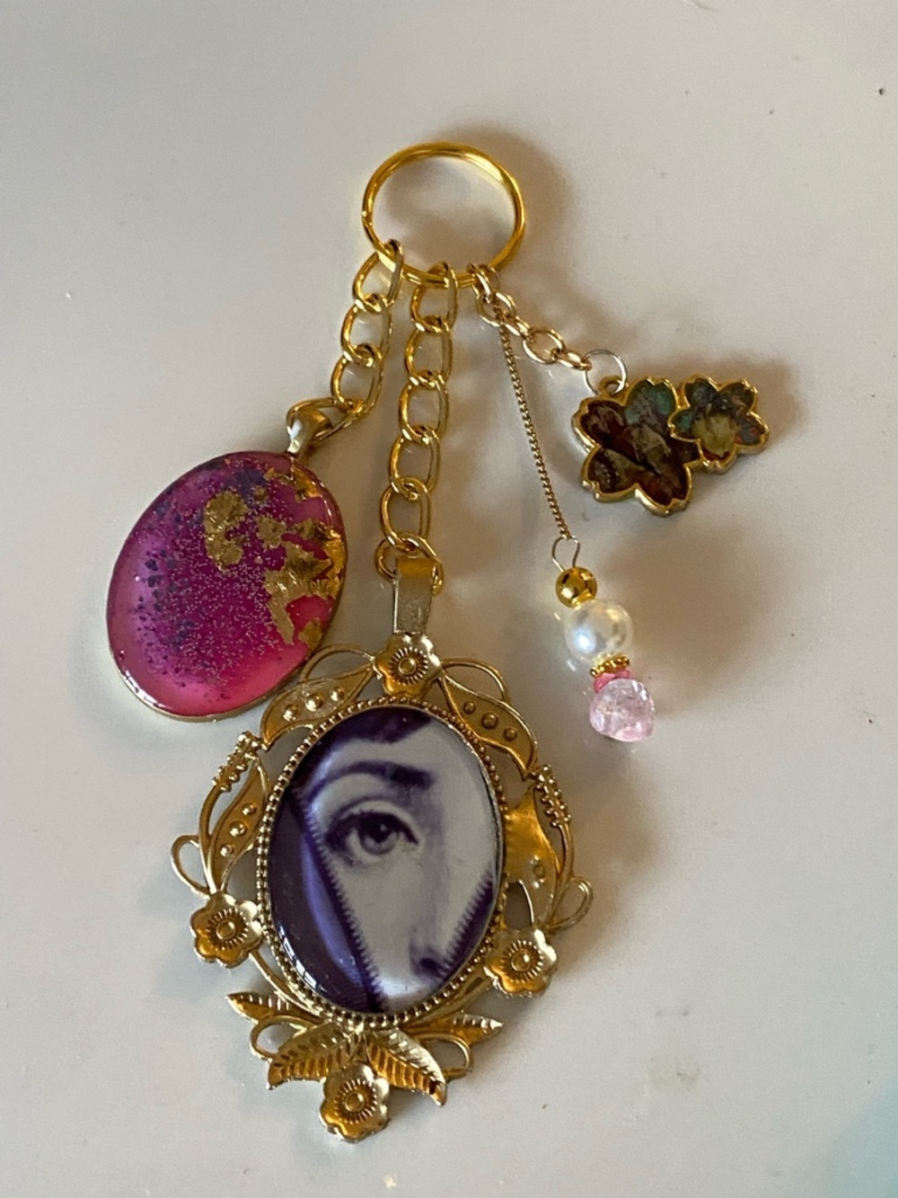 BAG CHARM KEYCHAIN PURSE ACCESSORIE FORNASETTI EVIL EYE PINK PURPLE FLORAL GOLD - Picture 6 of 6
